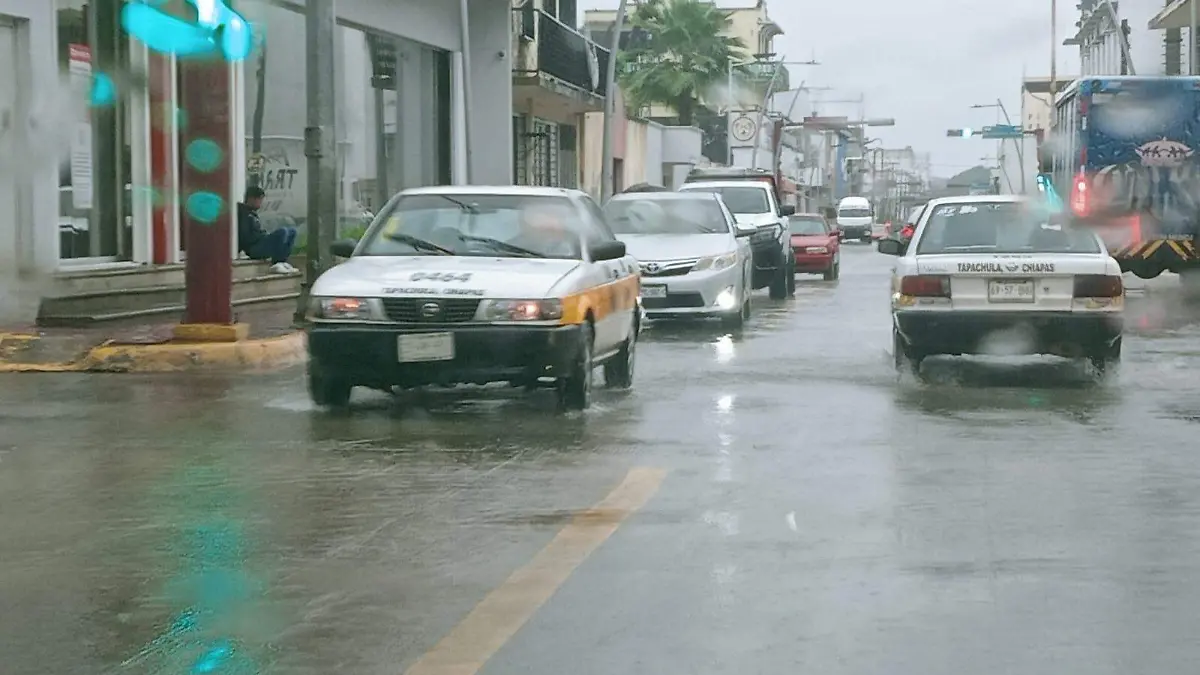 taxis en lluvia